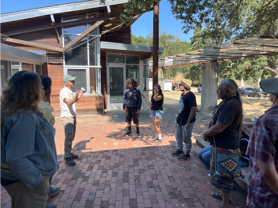 Trevor Hebert introduced wildlife camera technology to Muwekma youth members before going out to set up camera traps with them on July 10, a few weeks before the campout. Photo by Jorge Ramos.