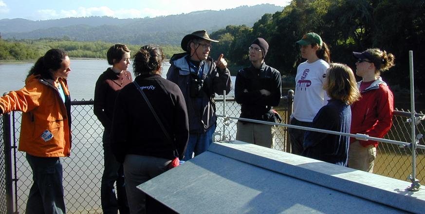 Professor Freyberg on Searsville Dam with students.