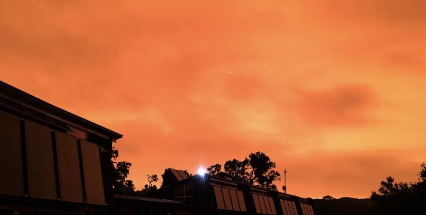 Wildfire smoke coloring the sky orange over Jasper Ridge